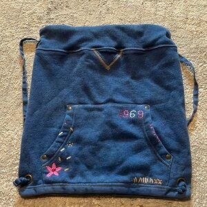 Vintage blue GAP with front pocket on backpack.